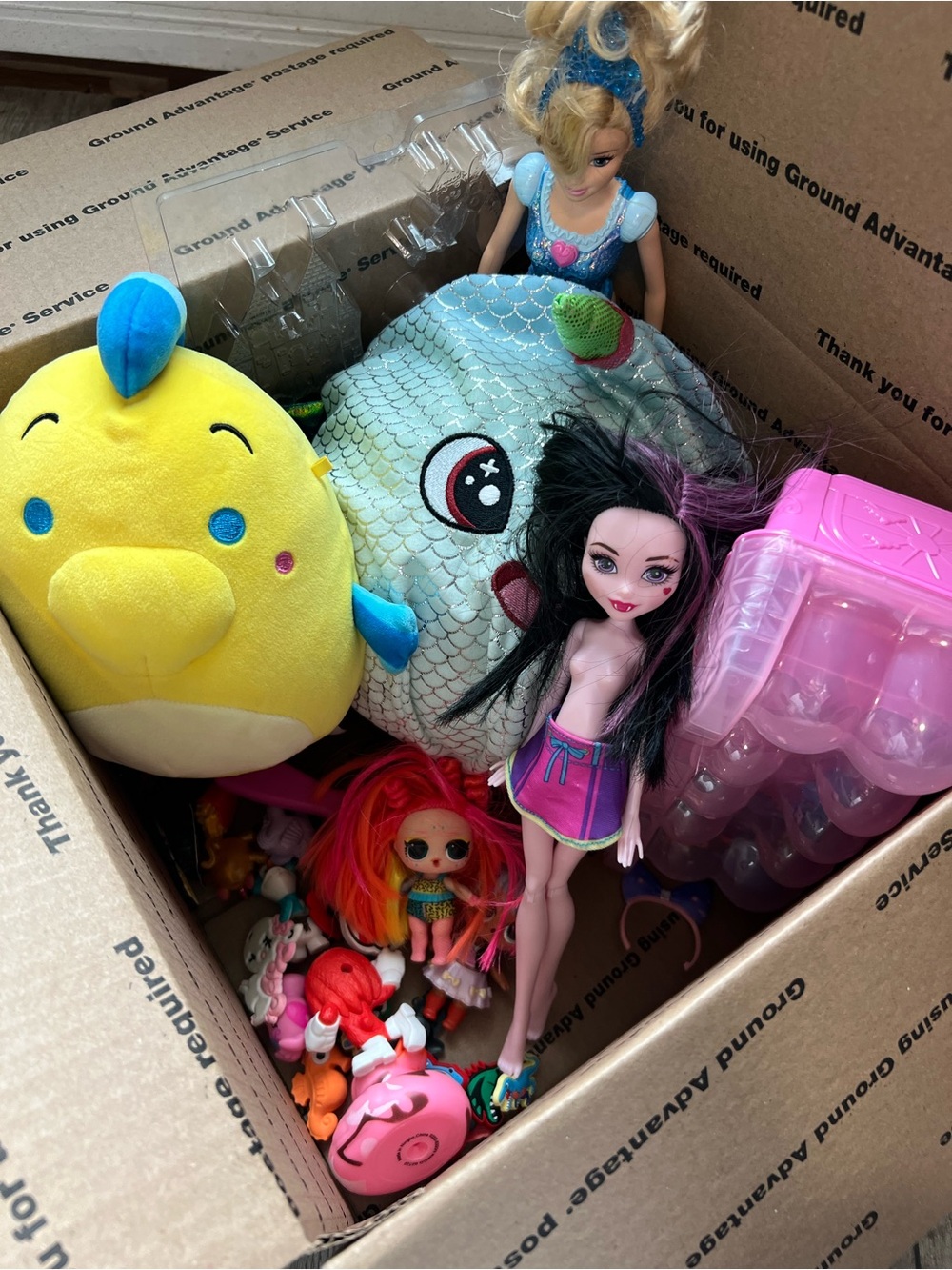 monster high doll with black & purple hair and teal outfit accessories